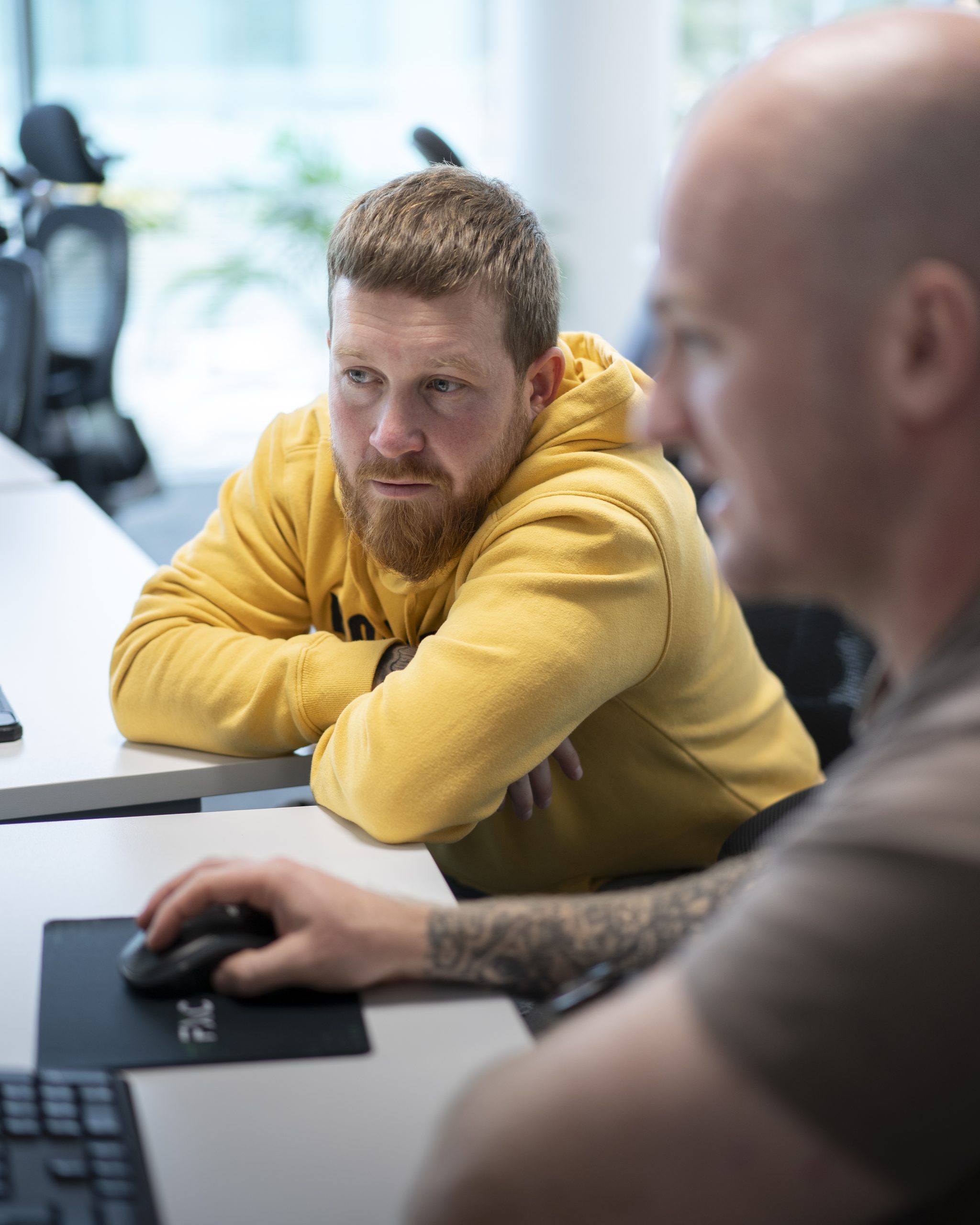 Looking at a computer at trading floor